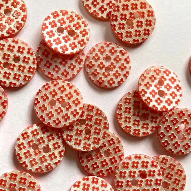 Red and White Lasered Shell Buttons 9/16"